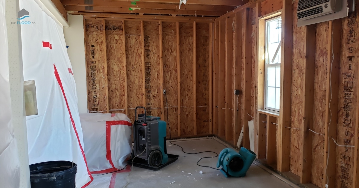 Professional water restoration team at work in a Utah residence